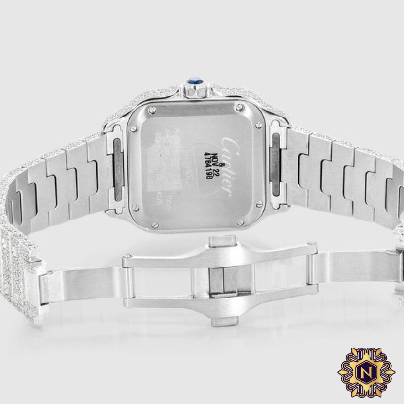 ICED OUT CARTIER
SANTOS 35MM
DIAMOND WATCH 14.7CT.