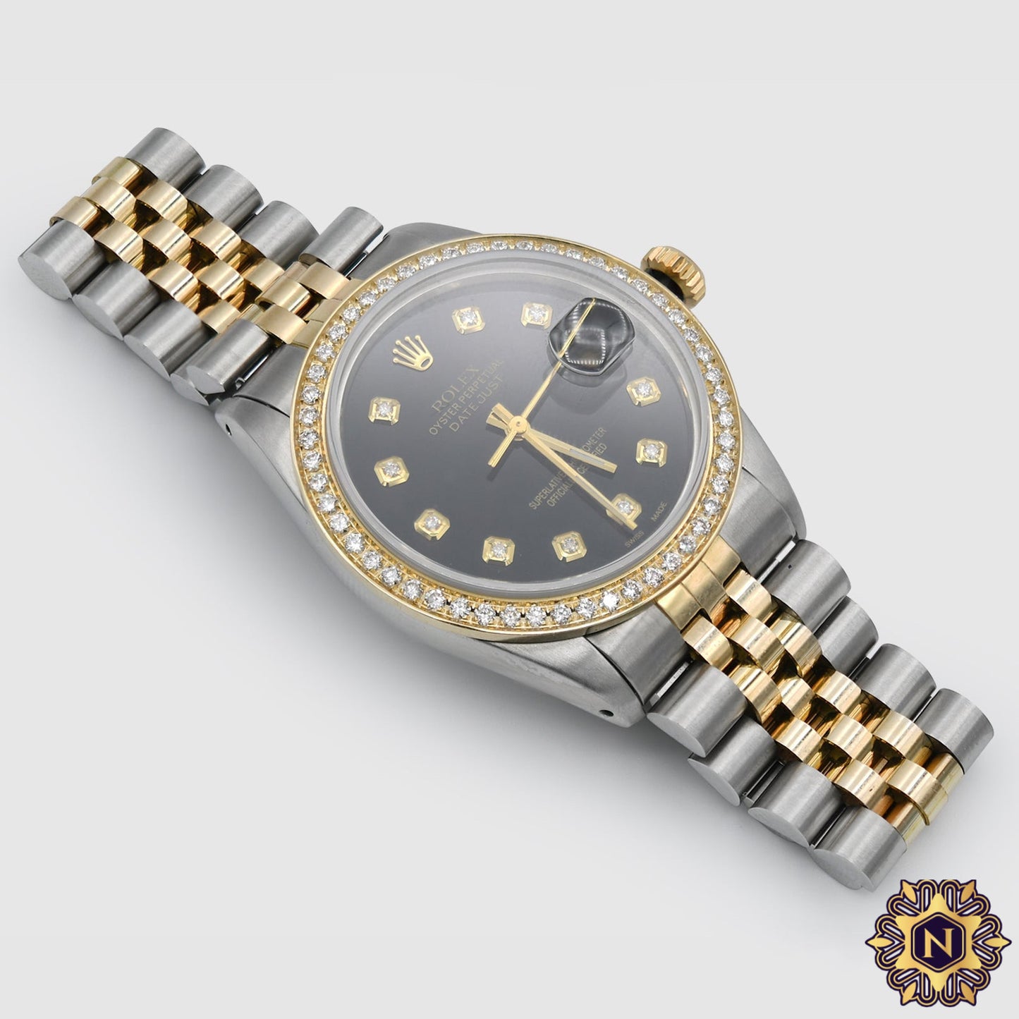 ICED OUT ROLEX
DATEJUST 36MM TWO-TONE GREEN DIAL 12.2CT.